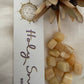 'Grace' Incense Packaged next to dried flowers and honey calcite crystals.